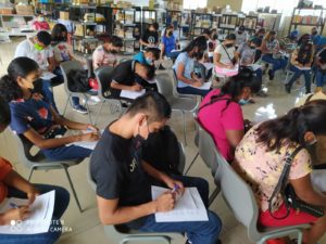 This is an image of students and their parents guardians during workshop